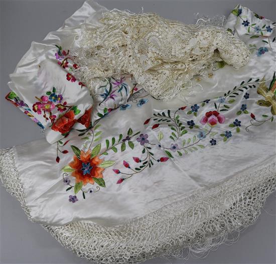 An embroidered shawl, Maltese lace shawl and embroidered pieces